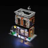 Rooftop view, lit interior revealed.