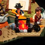 Lit covered wagon close-up.