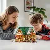 Building the Farm Store with a child.