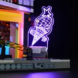 Purple glowing ice cream sign.