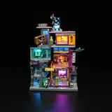 Side view, glowing city.