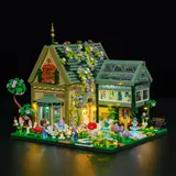 Low angle, glowing house at night.