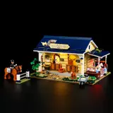 Illuminated stable at night.