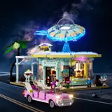 Interstellar Drive-In at night, fully lit.
