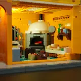 Detailed illuminated kitchen interior.