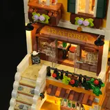 Illuminated Trattoria entrance.