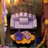 Interior of Lumibricks Retro House 10014's 'Divination Room' with lit crystal ball.