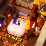 Interior of Lumibricks Retro House 10014's bedroom with themed bed and minifigure.
