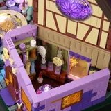 Interior of Lumibricks Retro House 10014's 'Divination Room' with lit shelves.