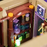 Interior of Lumibricks Retro House 10014's 'Herbal Kitchen' with glowing potions.