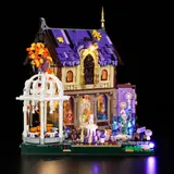 Lumibricks Retro House 10014 illuminated at night, highlighting specific sections.