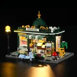 Lit newsstand, dark background.