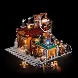 Angled view of lit steampunk factory with minifigs.