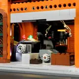 Interior factory close-up with hoist and crates.
