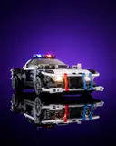 Front view of illuminated police car.