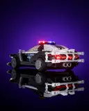 Rear view of glowing police car.