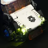 Close-up hood, emblem, headlights.