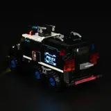Rear-right view, lit convoy.