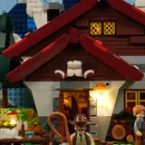 Cottage entrance with glowing lantern.