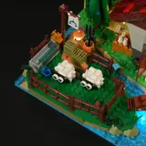 Aerial view of cottage and pasture.
