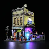 Illuminated Skate Shop exterior at night.
