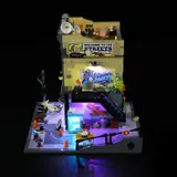 Rooftop view of lighted skate shop.