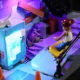 Detailed alleyway with glowing vending machine.