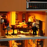 Lit workshop interior with tools.