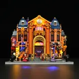 Frontal night view of opera house.