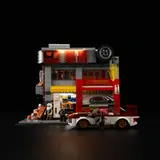 Illuminated Street Mod Garage at night.