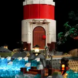 Lighthouse entrance with glowing waves.