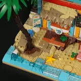 Close-up of the sandy beach and water.
