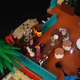 Rooftop bar lit at night.