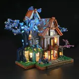 Lumibricks Sylvan Inn lit up at night.