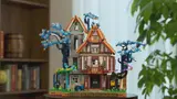 Unlit Sylvan Inn model in a room.