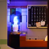 Upper chamber with azure light and chalkboard.