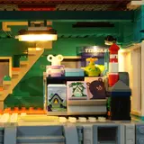 Lit retail interior, staircase.