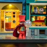 Minifigure on lit street.