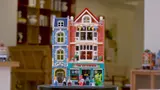 Unlit Toy Station facade, daylight.