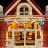 Upper window, hanging lanterns lit.