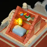 Lit attic bedroom.