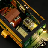 Overhead view of illuminated passenger car interior.