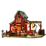 Daytime action scene with red barn, stables, and minifigures from Lumibricks Wild West Ranch Duel.