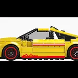 Side view of yellow rally car