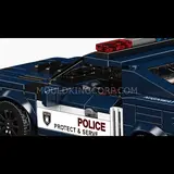 Front grill and headlight detail of the police car.