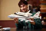 Man holding Lego Shuttle Carrier